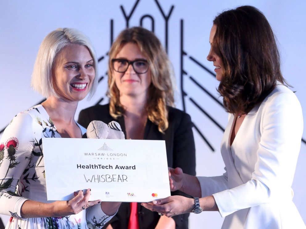PHOTO: Britains Catherine, Duchess of Cambridge awards Zuzanna Sielicka-Kalczynska from the Whisbear The Humming Bear company with the Health Tech Award at the Heart business incubator in the Warsaw Spire building in Warsaw, Poland, July 17, 2017.