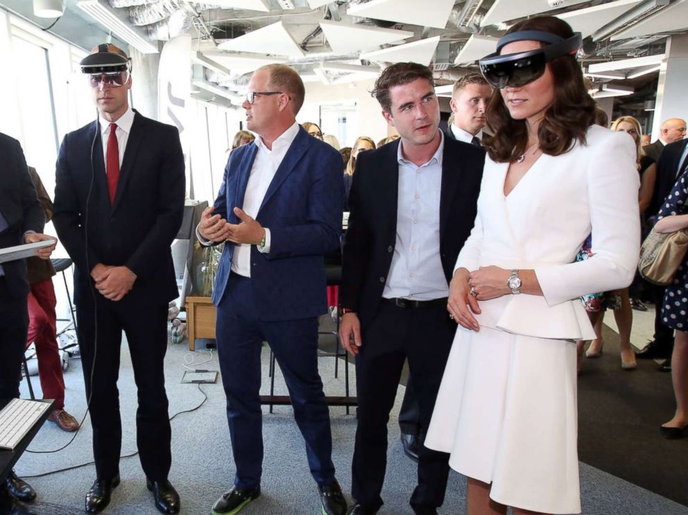 PHOTO: Britains Prince William and Duchess Catherine look through a virtual reality goggles as they meet with young Polish entrepreneurs at the Heart business incubator in the Warsaw Spire building in Warsaw, Poland, July 17, 2017.