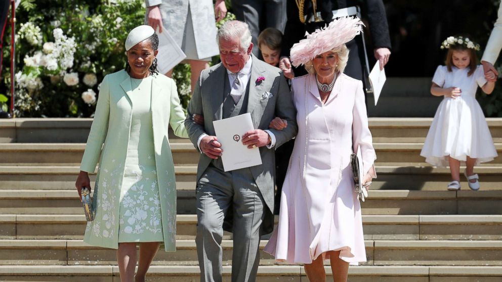 PHOTO: Doria Ragland, mother of the bride, Prince Charles, Prince of Wales and Camilla, Duchess of Cornwall walk down the steps at Windsor Castle after the wedding of Prince Harry and Meghan Markle, May 19, 2018.