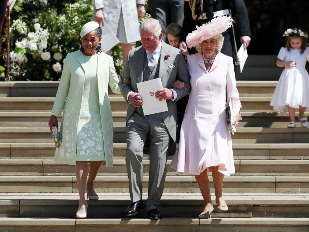 PHOTO: Doria Ragland, mother of the bride, Prince Charles, Prince of Wales and Camilla, Duchess of Cornwall walk down the steps at Windsor Castle after the wedding of Prince Harry and Meghan Markle, May 19, 2018.