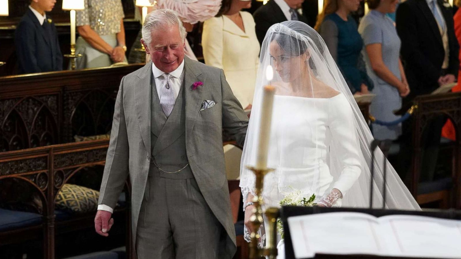 PHOTO: Prince Harry looks at his bride, Meghan Markle, as she arrives accompanied by the Prince of Wales in St George's Chapel at Windsor Castle for their wedding in Windsor, May 19, 2018.