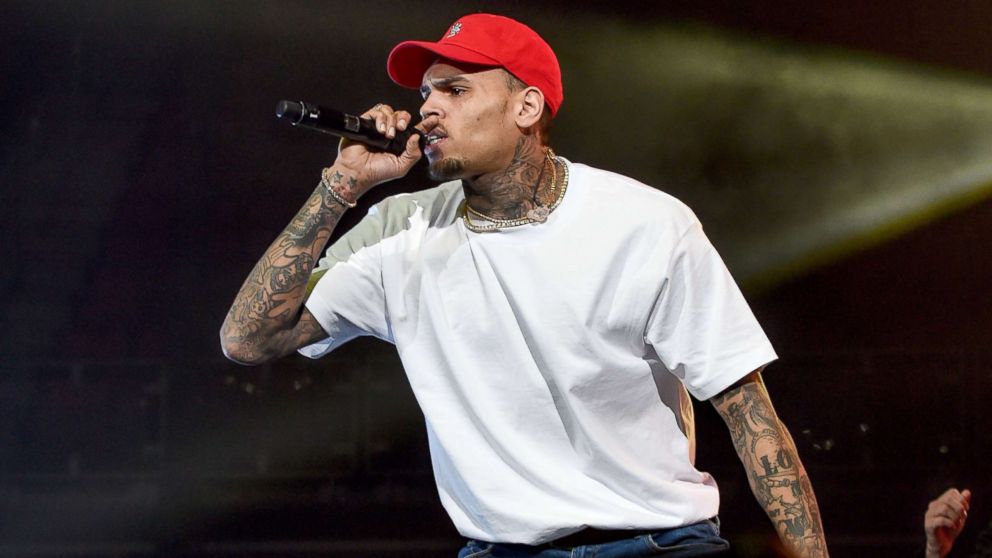 PHOTO: Chris Brown performs on stage at Little Caesars Arena, Dec. 28, 2017, in Detroit.