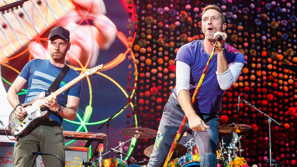 Chris Martin and Jonny Buckland from Coldplay perform at The Stade de France Arena in Paris, July 15, 2017. 
