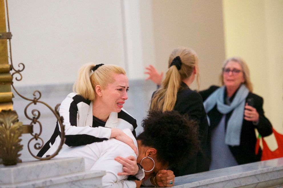 PHOTO: Bill Cosby accusers, from left, Caroline Heldman, Lili Bernard and Victoria Valentino, right, react outside the courtroom after Cosby was found guilty in his sexual assault retrial, April, 26, 2018.