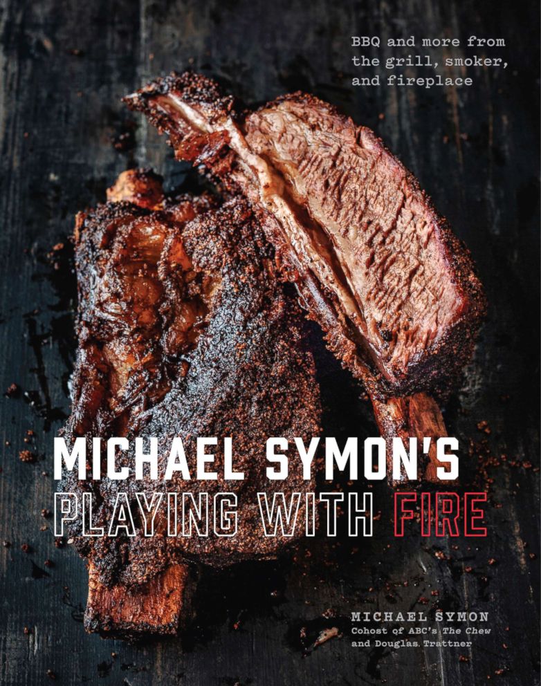 PHOTO: Michael Symon's new cookbook, "Michael Symon's Playing With Fire," is photographed here. 
