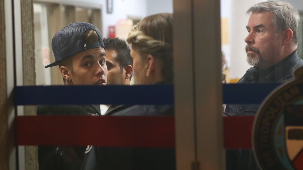 PHOTO: Justin Bieber arrived at a Toronto police station on Jan. 29, 2014 to face an assault charge in connection with an encounter with a limousine driver in Dec. 2013.