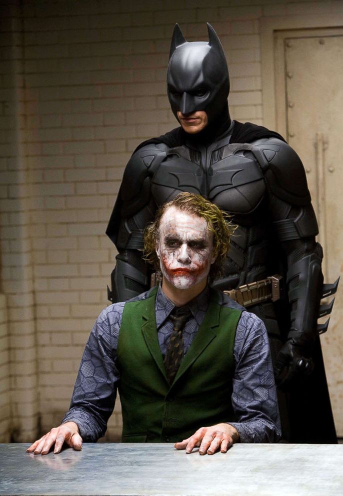 PHOTO: Christian Bale, as Batman, back, and Heath Ledger, as Joker, in a scene from "The Dark Knight."