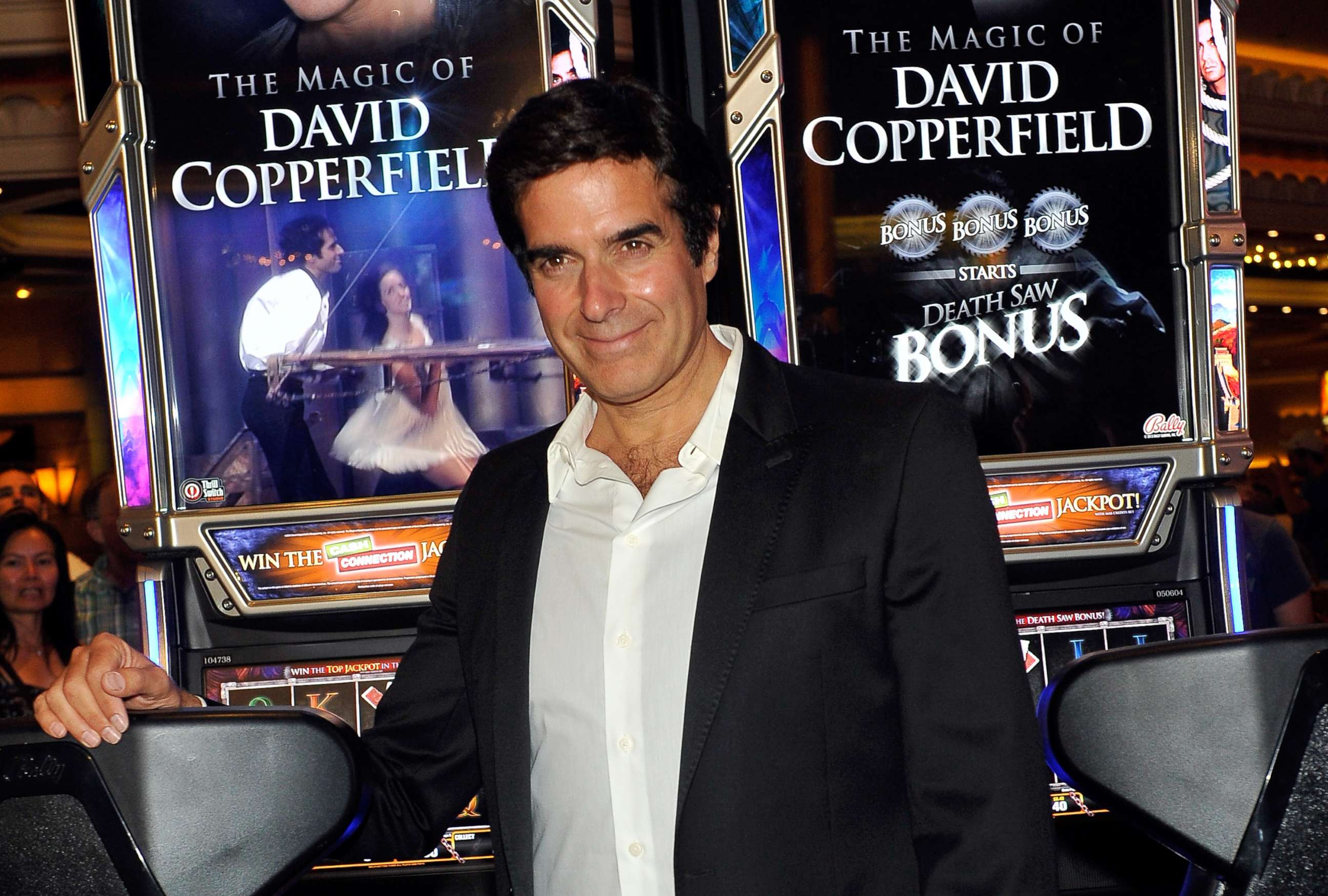 PHOTO: David Copperfield appears with a new slot machine, "The Magic of David Copperfield," by Bally Technologies during the unveiling at the MGM Grand Hotel/Casino in this June 26, 2014 file photo in Las Vegas. 