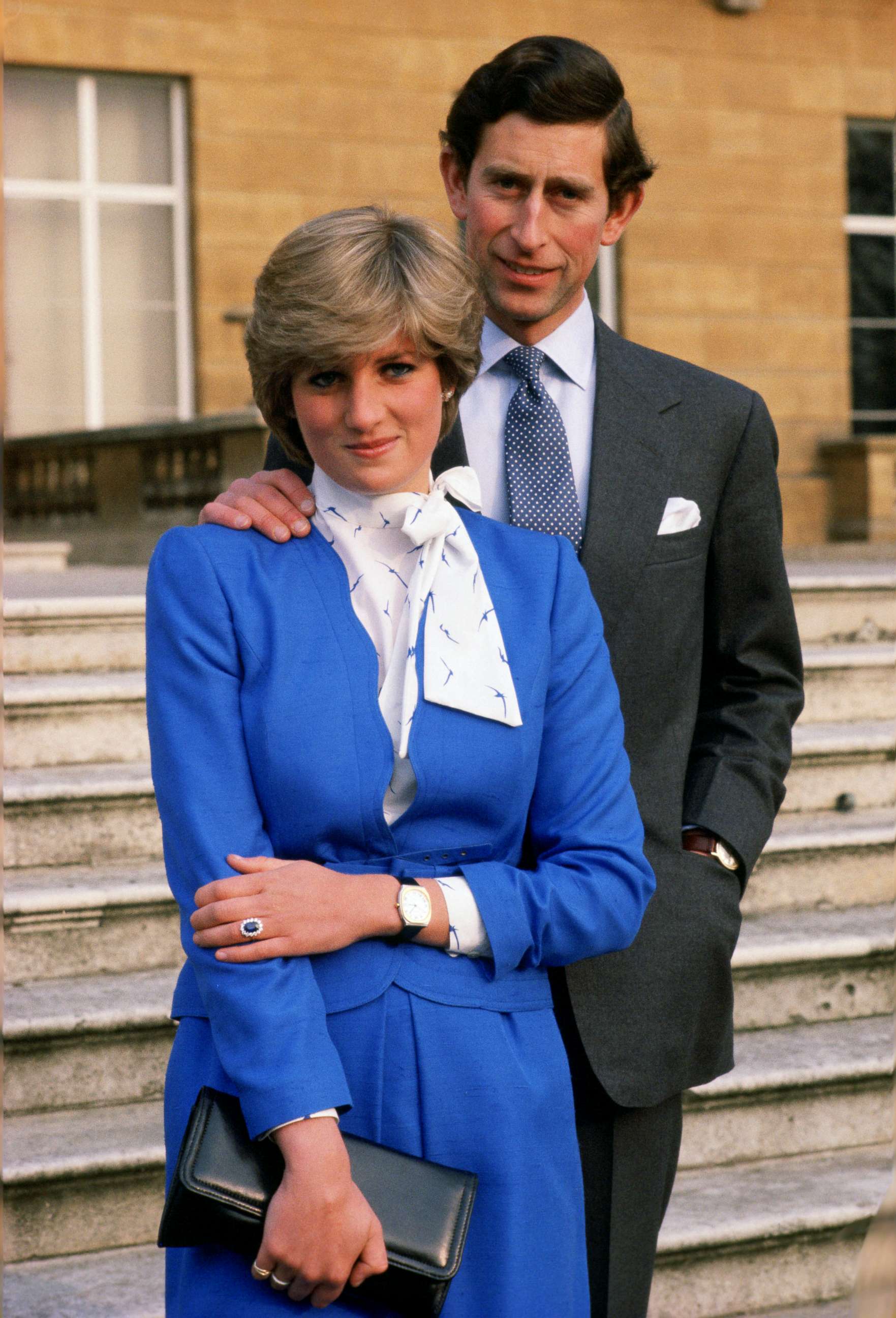 PHOTO: Lady Diana Spencer (later to become Princess of Wales) reveals her sapphire and diamond engagement ring alongside Prince Charles, Prince of Wales at Buckingham Palace following the announcement of their engagement.