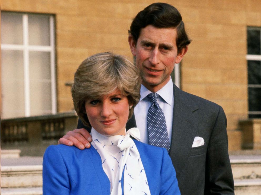 PHOTO: Lady Diana Spencer (later to become Princess of Wales) reveals her sapphire and diamond engagement ring alongside Prince Charles, Prince of Wales at Buckingham Palace following the announcement of their engagement.