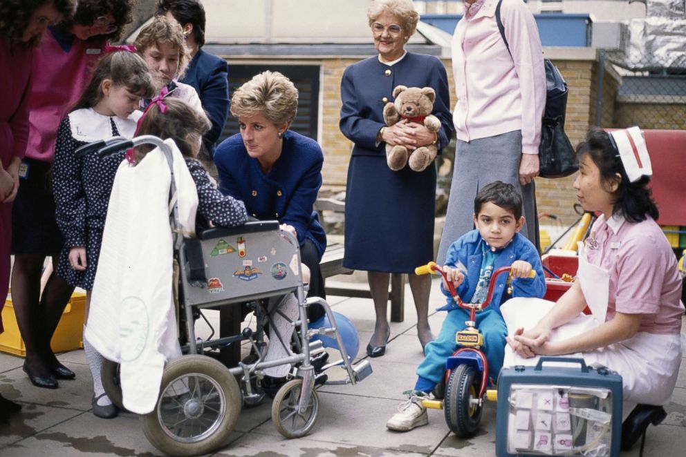 PHOTO: Princess Diana speaks with patients at the Great Ormond Street Children's hospital in London, March 1991. 
