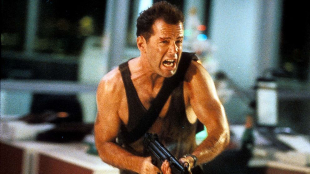 Bruce Willis in a scene from the film 'Die Hard', 1988.