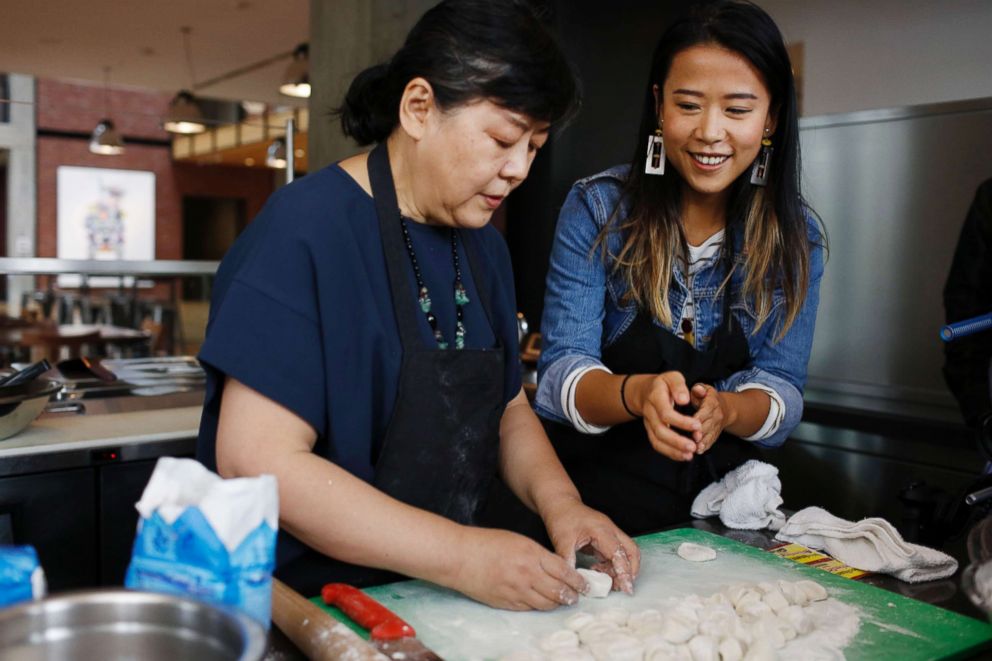 PHOTO: Domee Shi's mother made dumplings on set as reference for the film "Bao."