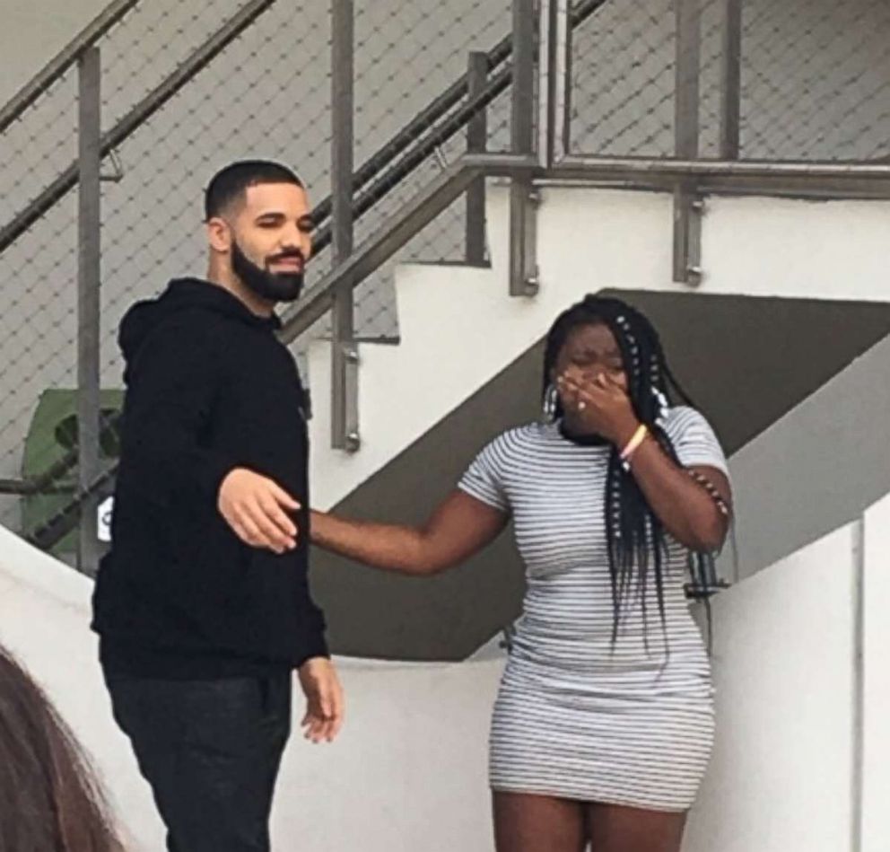 PHOTO: Drake presented Destiny James with a $50,000 check at the University of Miami, Feb. 6, 2018.