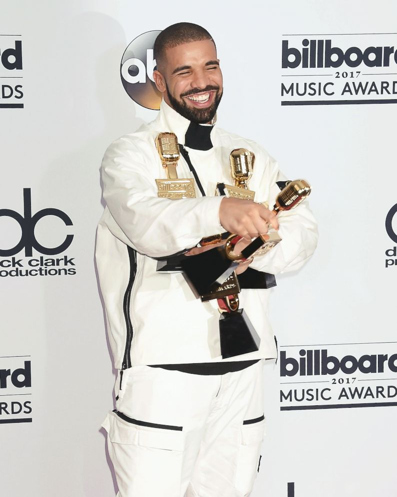 PHOTO: Rapper-singer-songwriter Drake poses with awards at the 2017 Billboard Music Awards at T-Mobile Arena, May 21, 2017, in Las Vegas.