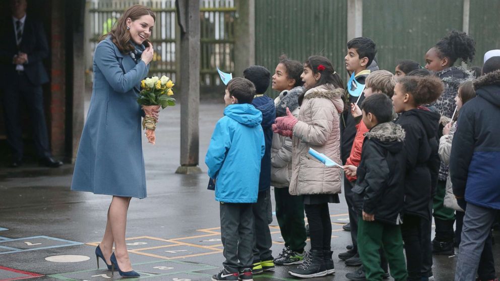 PHOTO: The Duchess of Cambridge greets children as she arrives at Roe Green Junior School where she will launch a mental health program for schools, Jan. 23, 2018, in Brent, London.
