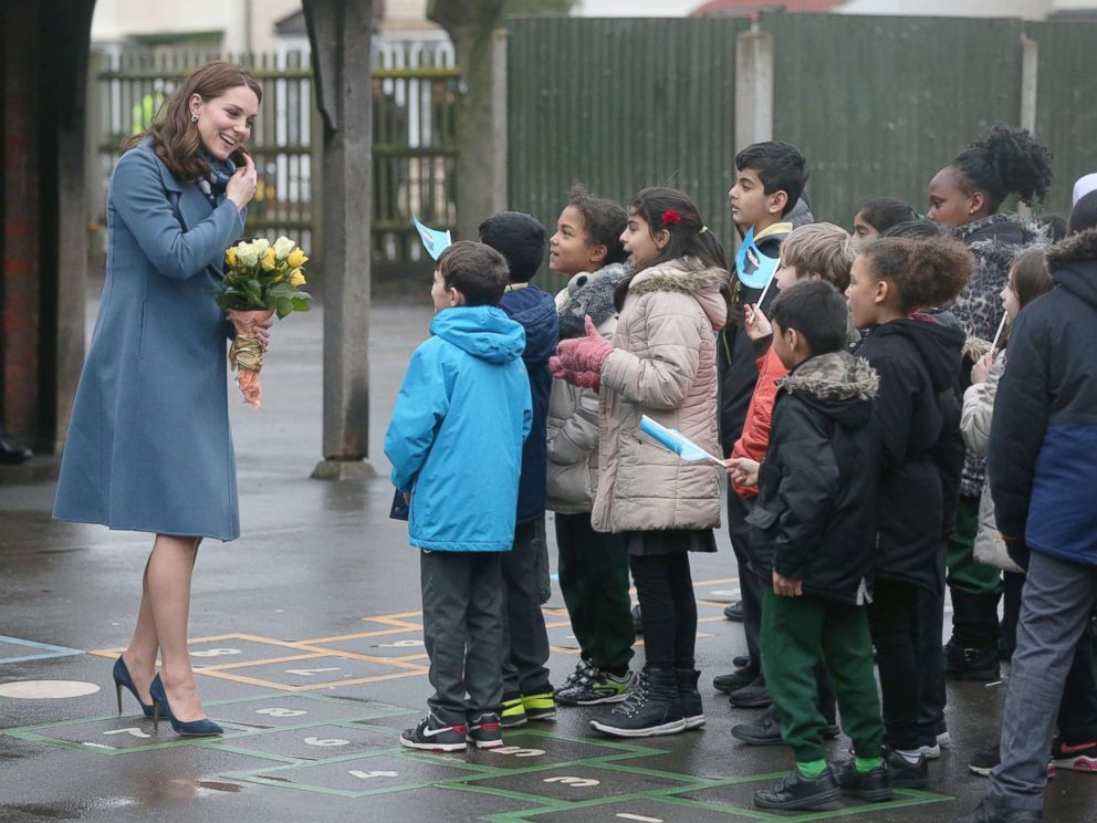 PHOTO: The Duchess of Cambridge greets children as she arrives at Roe Green Junior School where she will launch a mental health program for schools, Jan. 23, 2018, in Brent, London.