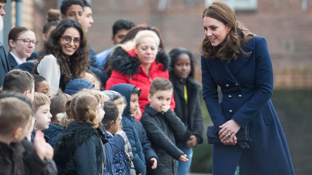 Pregnant Princess Kate visits with schoolchildren a day after ...