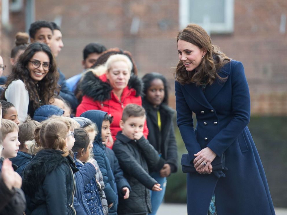 Pregnant Princess Kate visits with schoolchildren a day after ...