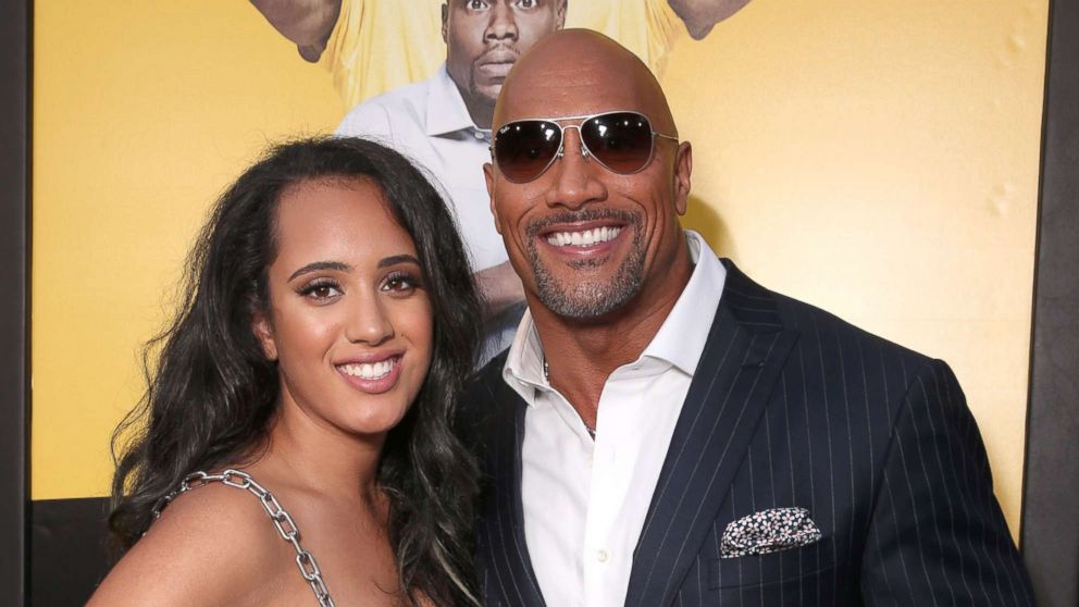 PHOTO: Dwayne Johnson with his daughter Simone Alexandra Johnson at the premiere Of Warner Bros. Pictures' "Central Intelligence" at Westwood Village Theatre on June 10, 2016 in Westwood, California.