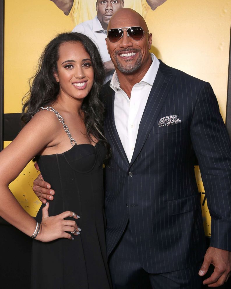 PHOTO: Dwayne Johnson with his daughter Simone Alexandra Johnson at the premiere Of Warner Bros. Pictures' "Central Intelligence" at Westwood Village Theatre on June 10, 2016 in Westwood, California.