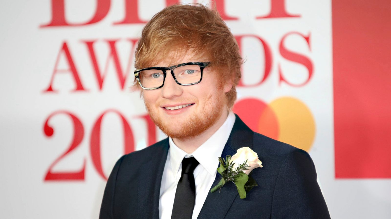 PHOTO: Ed Sheeran poses for photographers upon arrival at the Brit Awards 2018 in London, Feb. 21, 2018.