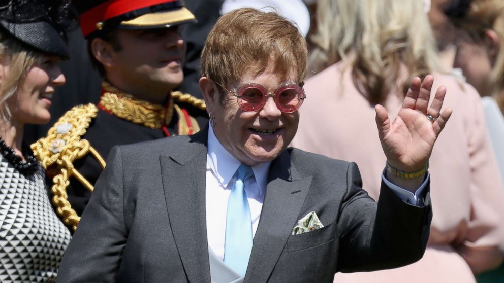 Sir Elton John arrives at the wedding of Prince Harry to Meghan Markle at St. George's Chapel, Windsor Castle on May 19, 2018 in Windsor, England.