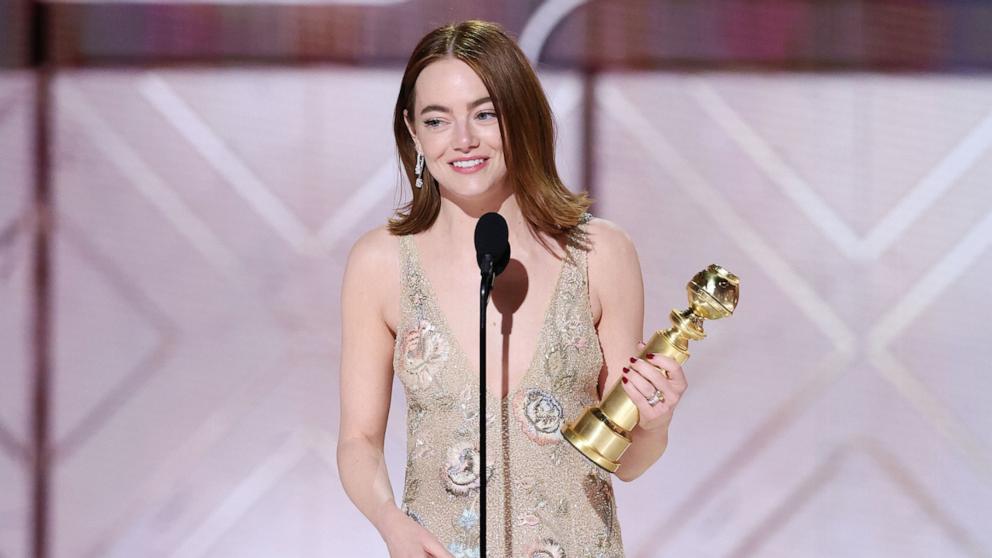 PHOTO: Emma Stone accepts the award for Best Performance by a Female Actor in a Motion Picture  Musical or Comedy for "Poor Things" at the 81st Golden Globe Awards, Jan. 7, 2024 in Beverly Hills.