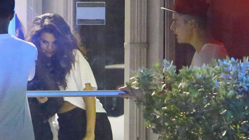 Pop star Justin Bieber and his on again/off again girlfriend Selena Gomez head to Hit Factory on April 8, 2014 in Miami, Florida. 