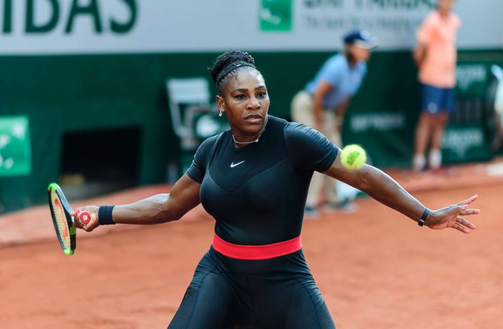 PHOTO: Serena Williams hits a forehand to Julia Goerges of Germany in the third round of the women's singles during the French Open at Roland Garros on June 2, 2018 in Paris. 