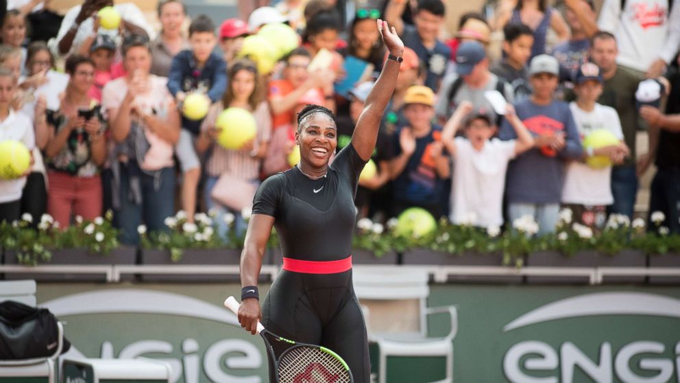 PHOTO: Serena Williams of the United States celebrates her win against Julia Goerges of Germany on Court Suzanne Lenglen in the Women's Singles Competition at the 2018 French Open Tennis Tournament, June 2, 2018, in Paris.