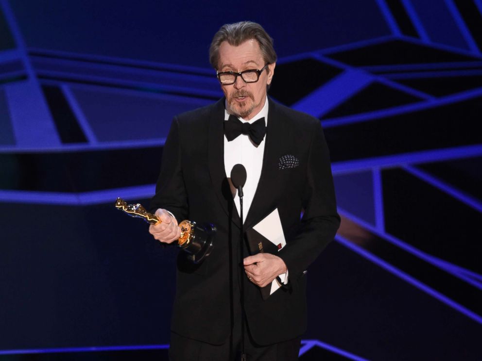 PHOTO: Gary Oldman accepts the award for best performance by an actor in a leading role for "Darkest Hour" at the Oscars, March 4, 2018, in Los Angeles.