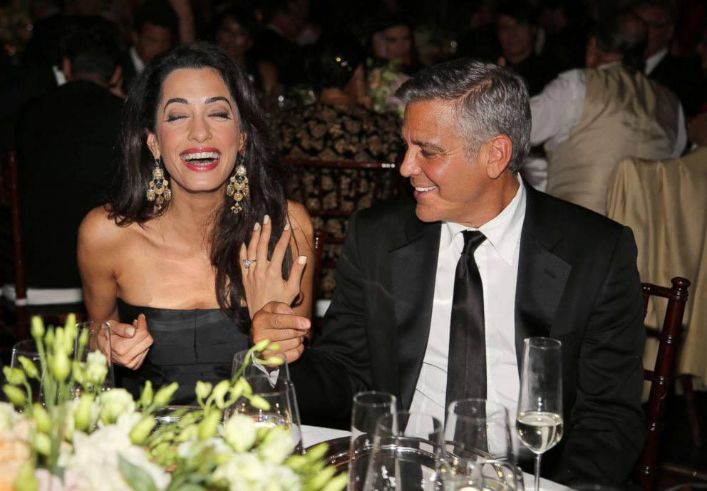 PHOTO: George Clooney and fiance Amal Alamuddin attend a benefit on Sept. 7, 2014 in Florence, Italy.