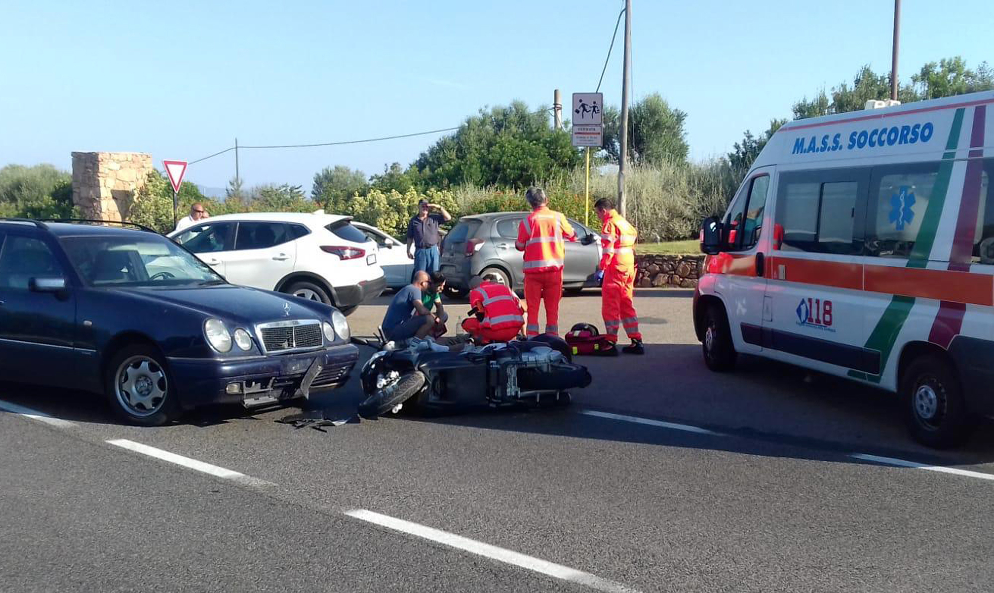 PHOTO: Ambulance personnel tend to George Clooney, after being involved in a scooter accident near Olbia, on the Sardinia island, Italy, July 10, 2018.