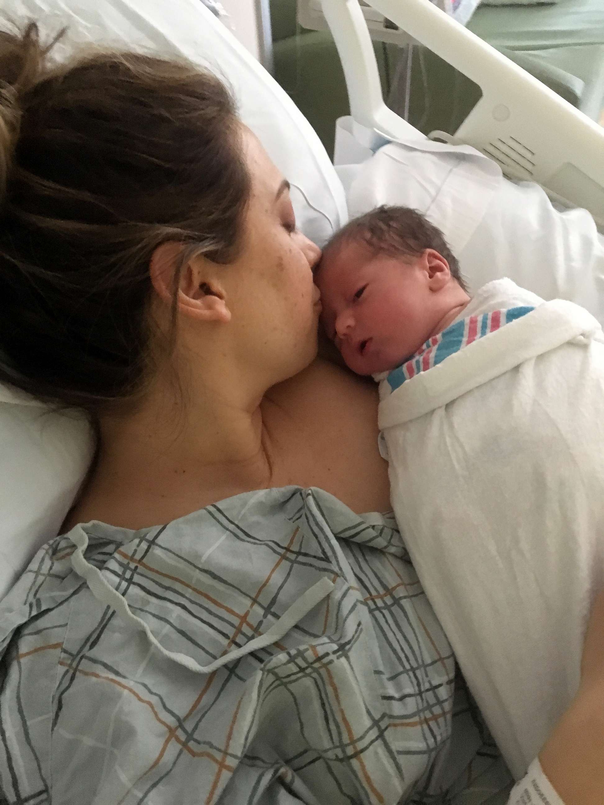 PHOTO: Ginger Zee shared a moment of her son, Adrian, hugging his new baby brother, Miles Macklin.