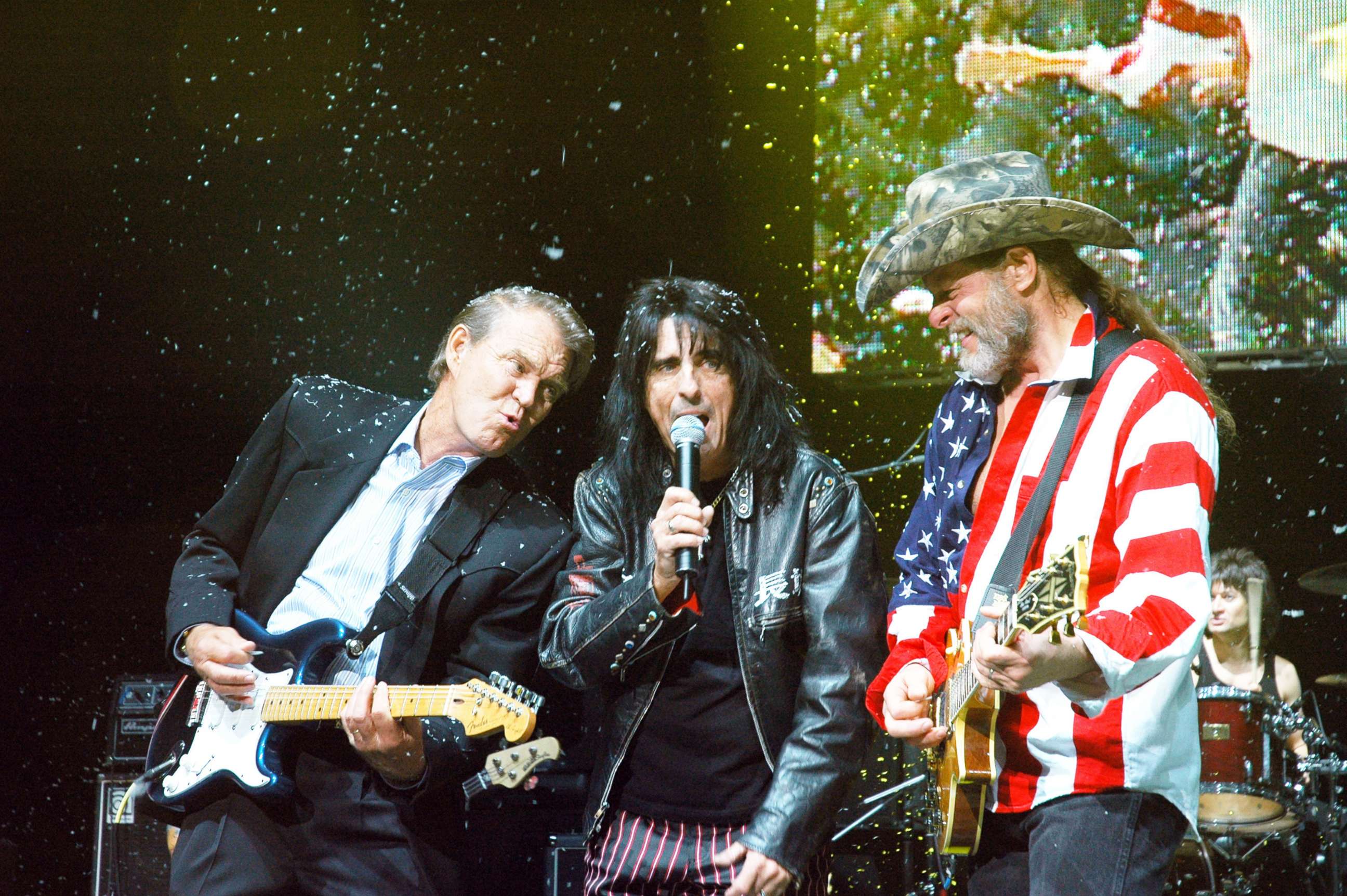 PHOTO: Glen Campbell, Alice Cooper and Ted Nugent perform on stage.