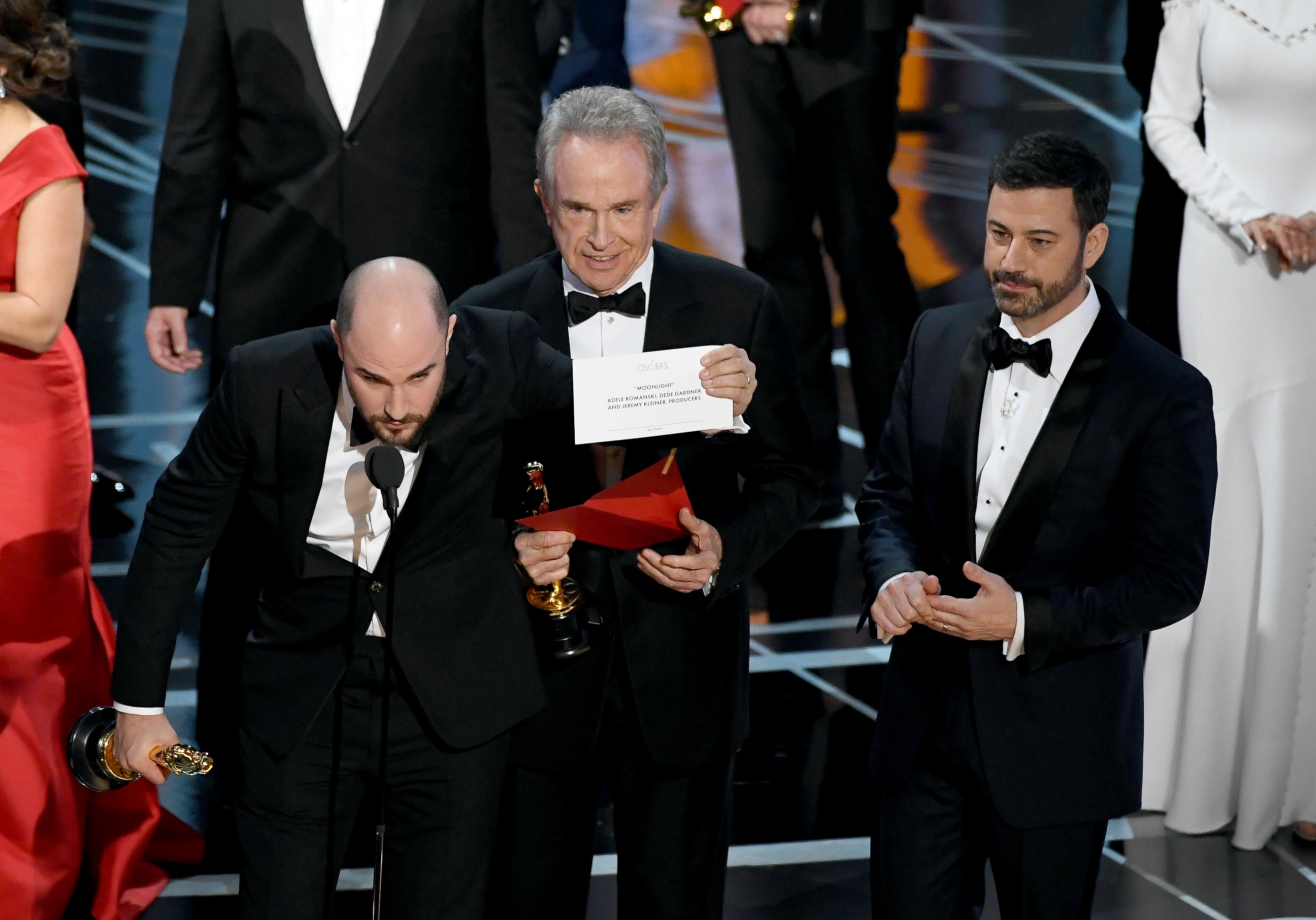 PHOTO: "La La Land" producer Jordan Horowitz holds up the winner card reading actual Best Picture winner "Moonlight" as Warren Beatty and Jimmy Kimmel look on during the 89th Annual Academy Awards on Feb. 26, 2017 in Hollywood, Calif.