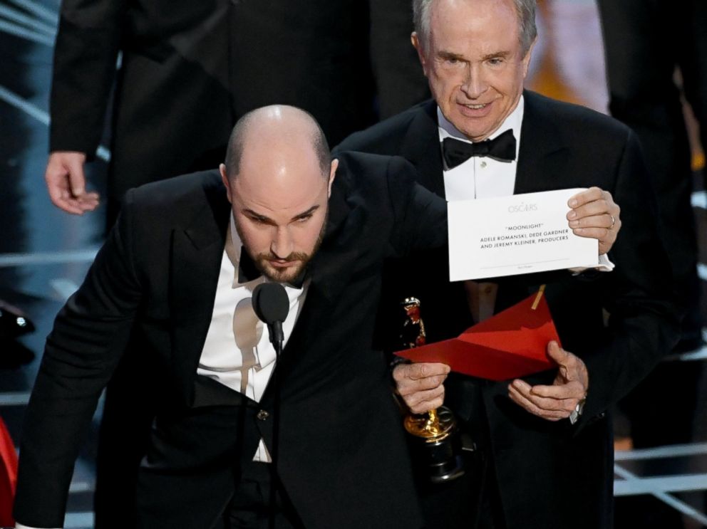 PHOTO: La La Land producer Jordan Horowitz holds up the winner card reading actual Best Picture winner Moonlight as Warren Beatty and Jimmy Kimmel look on during the 89th Annual Academy Awards on Feb. 26, 2017 in Hollywood, Calif.