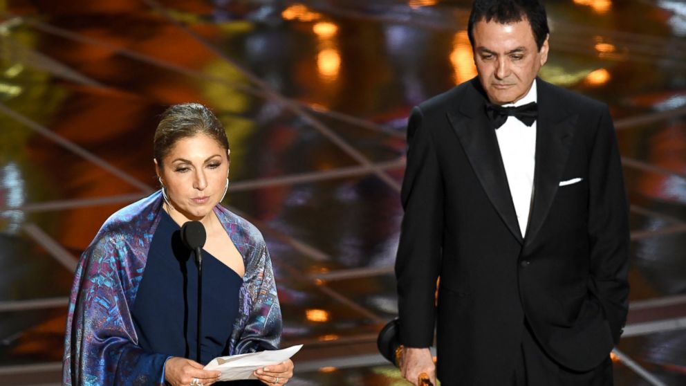 Engineer/astronaut Anousheh Ansari (L) and former NASA scientist Firouz Naderi accept Best Foreign Language Film for 'The Salesman' on behalf of director Asghar Farhadi during the 89th Annual Academy Awards, Feb. 26, 2017, in Hollywood, Calif. 