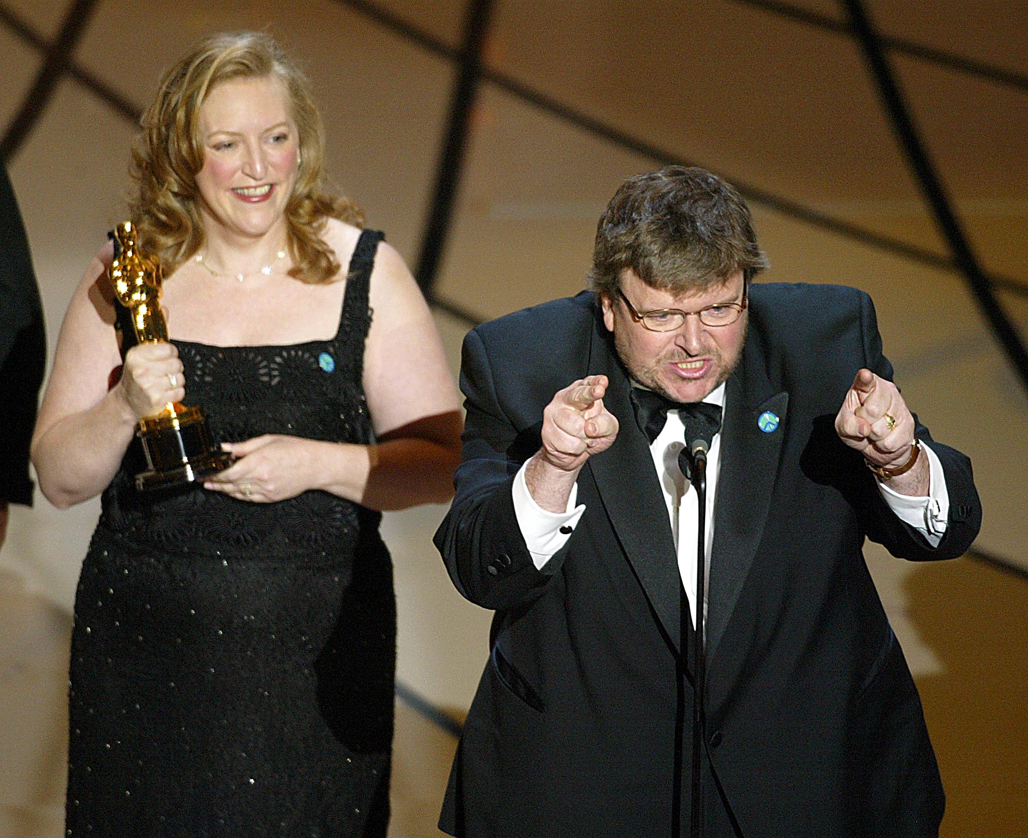 PHOTO: Filmmaker Michael Moore spoke out against President George W. Bush and the war in Iraq while accepting his Oscar for "Bowling for Columbine" during the 75th Academy Awards in Hollywood, Calif., March 23, 2003.