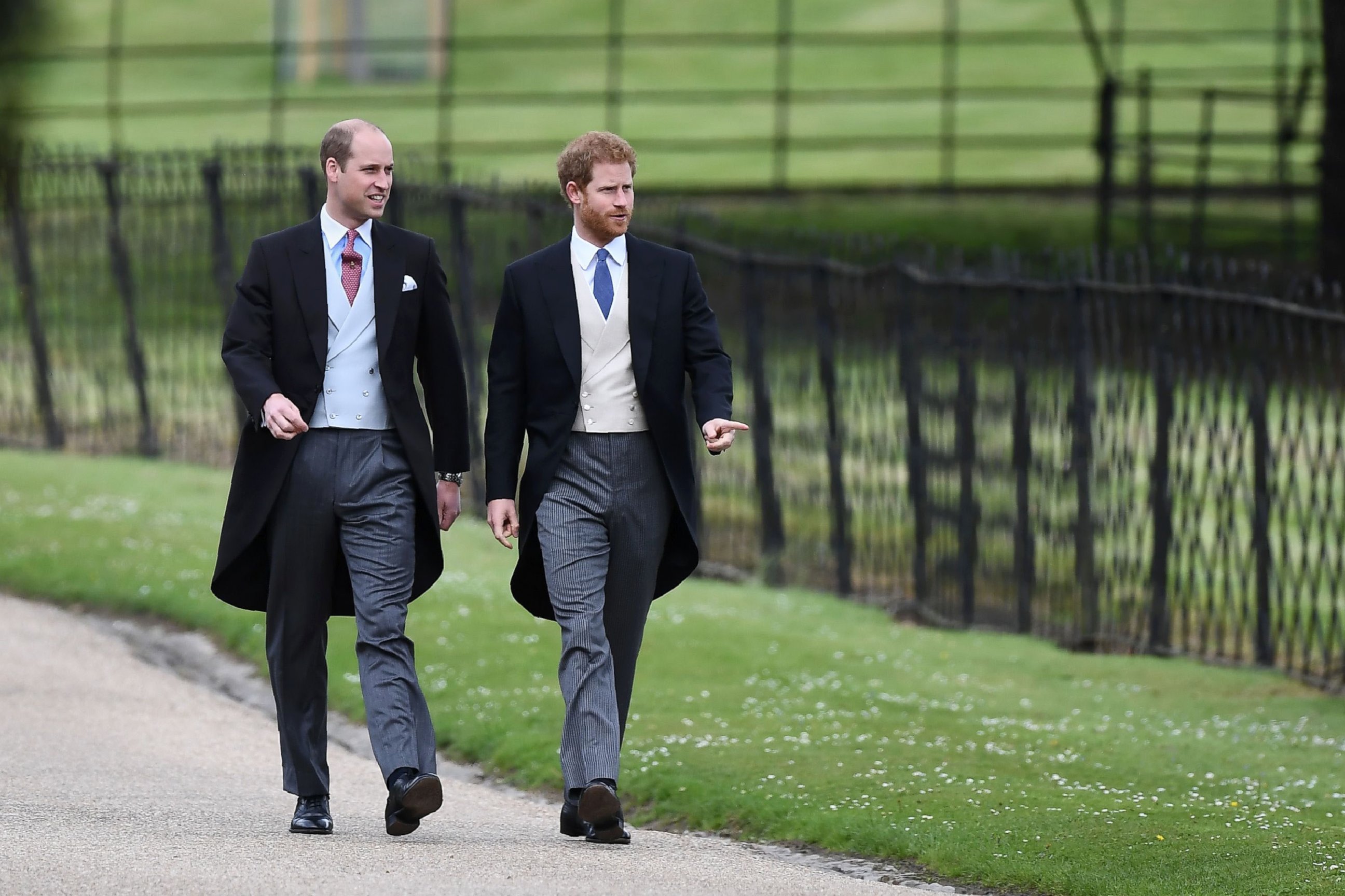 PHOTO: Prince Harry and Prince William walk to the church for the wedding of Pippa Middleton and James Matthews at St Mark's Church in Englefield, west of London, May 20, 2017.