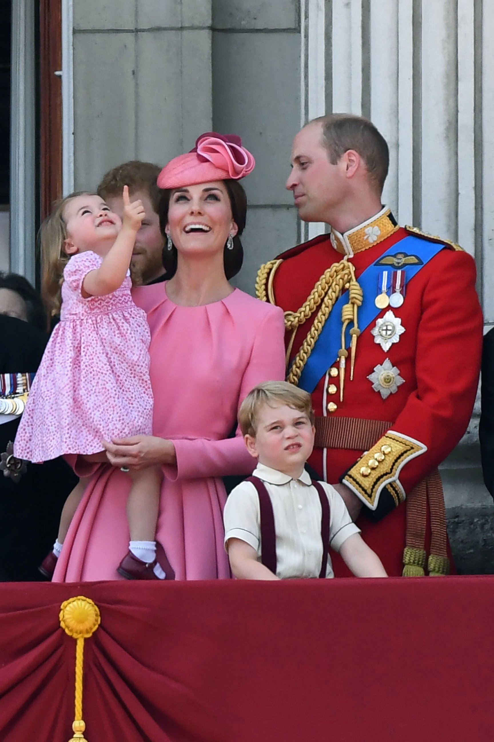 PHOTO:  Prince William and Duchess Catherine, with their children, Princess Charlotte and Prince George, watch a fly-past of aircraft by the Royal Air Force, during the Trooping the Colour in London, June 17, 2017.