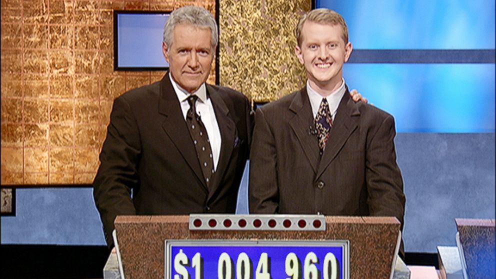 PHOTO: Alex Trebek poses with contestant Ken Jennings after his earnings from his record breaking streak on the gameshow surpassed 1 million dollars on July 14, 2004 in Culver City, Calif.