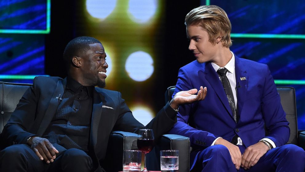 PHOTO: Roastmaster Kevin Hart and Justin Bieber onstage at The Comedy Central Roast of Justin Bieber on March 14, 2015 in Los Angeles. 