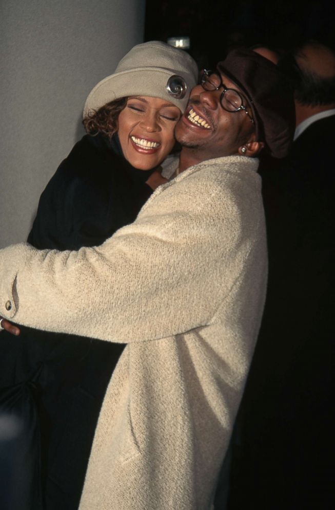 PHOTO: Bobby Brown and Whitney Houston hug at the premiere of "Cinderella" at Sony Lincoln Square Theater in New York, Oct. 27, 1997.