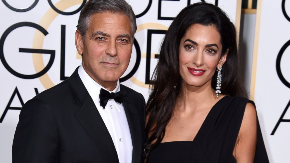 PHOTO: Actor George Clooney (L) and attorney Amal Alamuddin Clooney attend the Golden Globe Awards, Jan. 11, 2015 in Beverly Hills, California. 