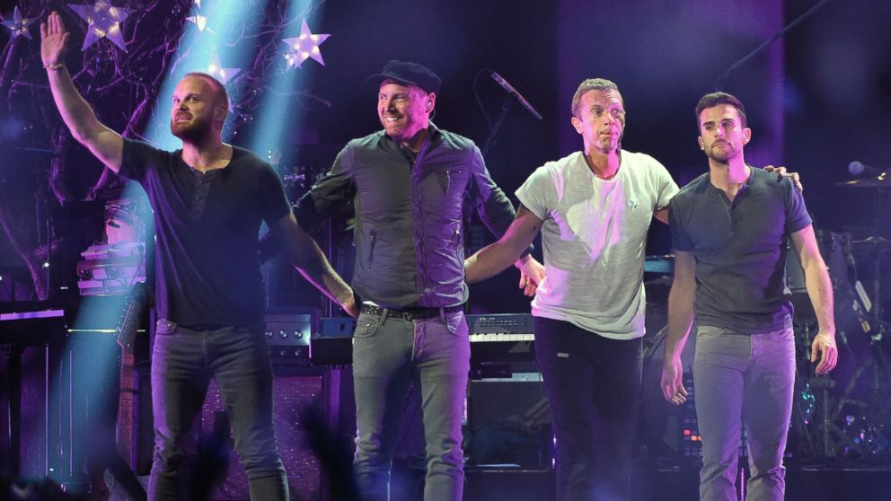 Will Champion, Jonny Buckland, Chris Martin and Guy Berryman of Coldplay appear on stage during the 2014 iHeartRadio Music Festival on Sept. 19, 2014 in Las Vegas, Nevada.