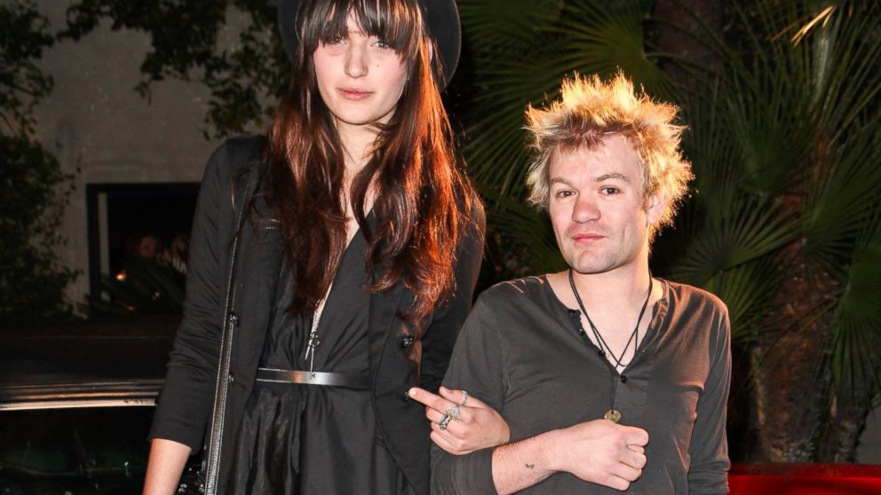 Deryck Whibley of Sum 41 and model Ariana Cooper are seen at an event in this file photo, Feb. 26, 2012,  in Los Angeles.