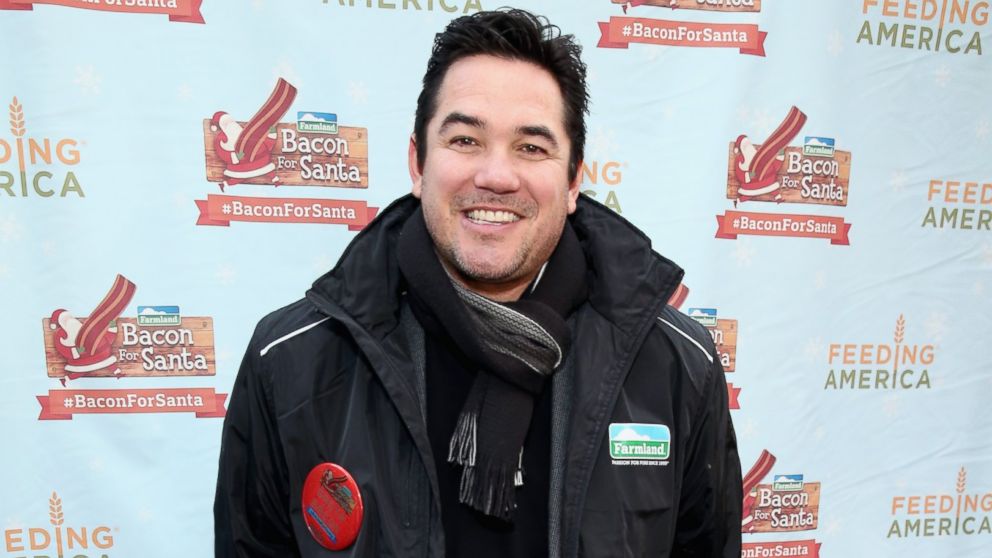 Dean Cain and Farmland rally with Santa Claus in Herald Square Park pledging #BaconForSanta to help fight hunger this holiday season with Feeding America on Dec. 4, 2014 in New York City.