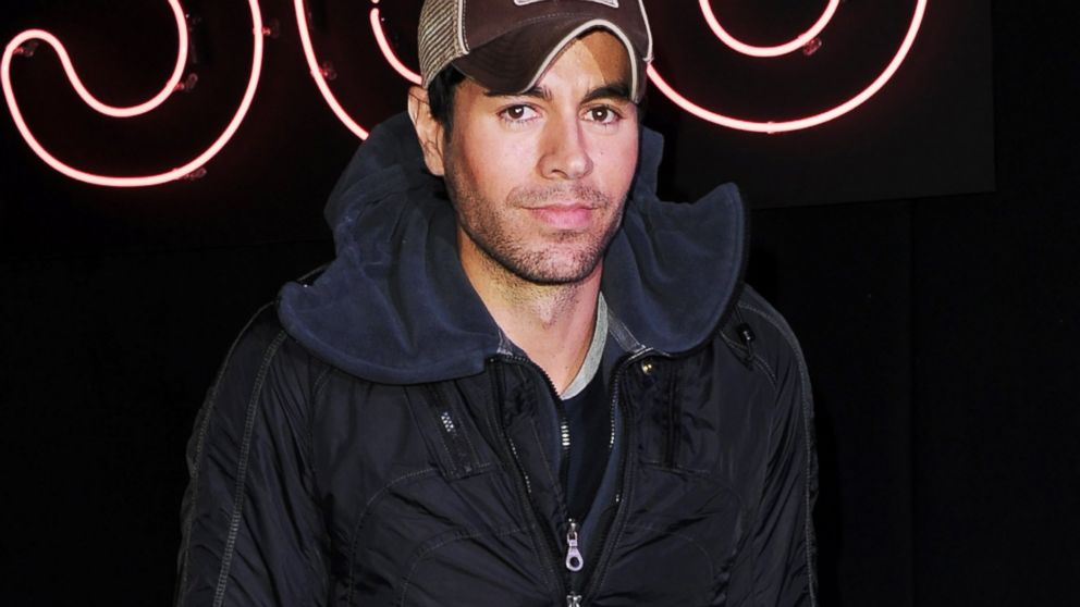Enrique Iglesias meets fans and signs copies of his new album 'Sex + Love' at HMV, Oxford Street on March 27, 2014 in London, England. 